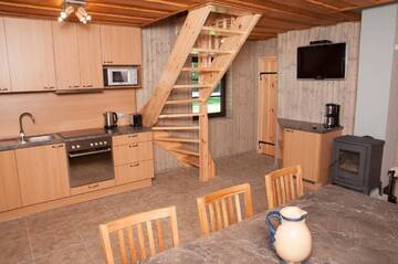 Фото номера Дом для отпуска с видом на озеро Дома для отпуска Karujärve Camping г. Paiküla 5