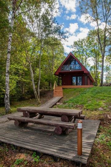 Фото номера Дом для отпуска с 3 спальнями, вид на озеро Дома для отпуска Karujärve Camping г. Paiküla 4